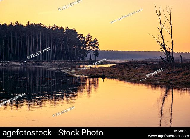 Sunset over Bug river near Szumin village, Mazowsze region of Poland