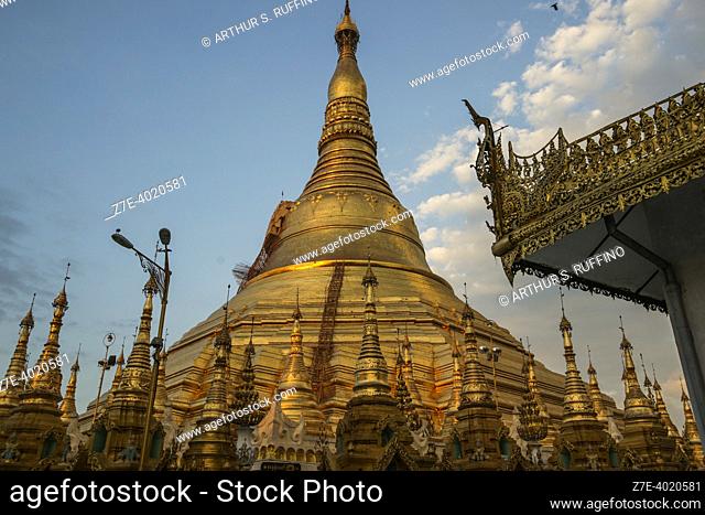 Gilded stupa surrounded by pavilions, shrines, statues, etc. Shwedagon Pagoda complex, Singuttara Hill, Yangon, Myanmar, Southeast Asia