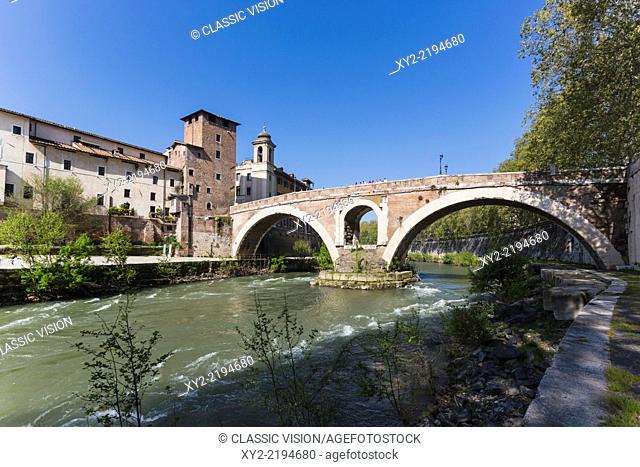 Rome, Italy. Isola Tiberina or Tiber Island with the Ponte Fabricio built in the first century BC