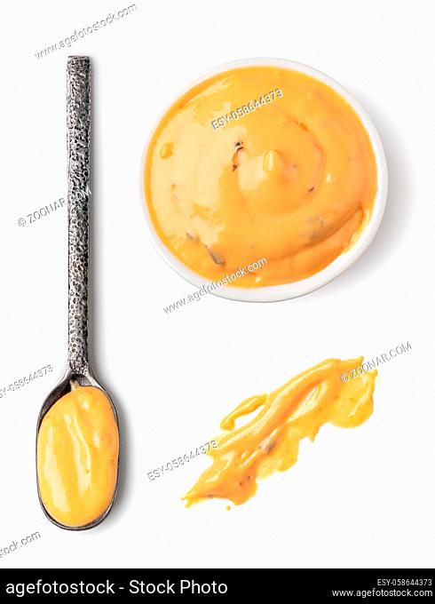 Bowl and spoon with Cocktail sauce isolated on white background