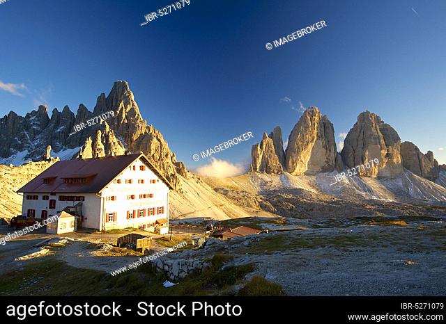 Three Peaks Hut and Chapel in front of Parternkofel and north faces of the Three Peaks, Sesto Dolomites, Trentino-South Tyrol, Italy, Europe