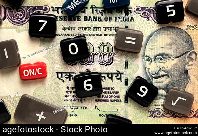 Calculator keys on Indian banknote