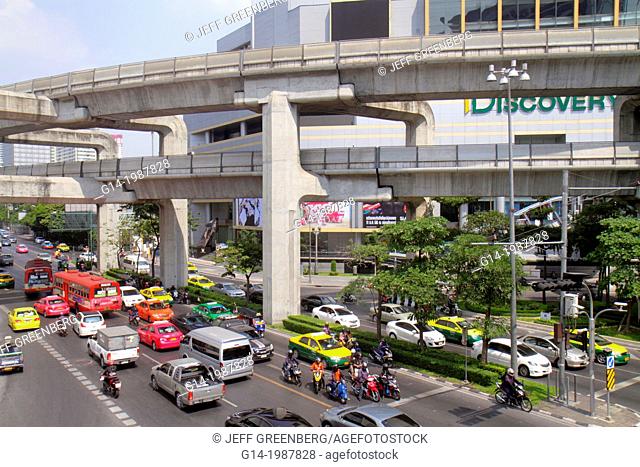 Thailand, Bangkok, Pathum Wan, Phaya Thai Road, traffic, taxi, taxis, cabs, motorcycles, motor scooters, bus, Skywalk, view, overhead, aerial