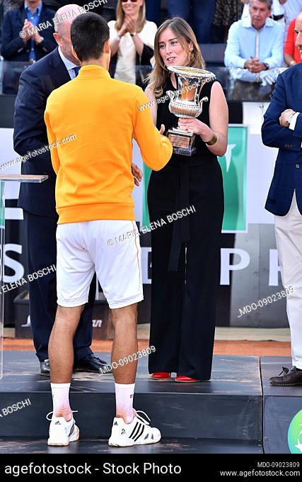 Italian minister Maria Elena Boschi gives the cup to Serbian tennis player Novak Djokovic, winner of the Internationali BNL d’Italia at Foro Italico