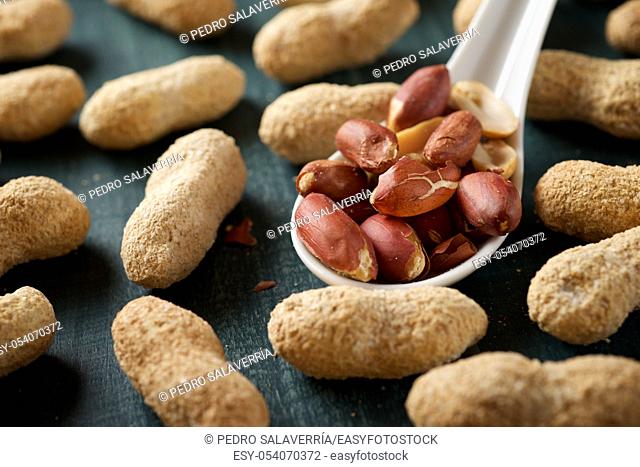 Peanuts with shell on a table