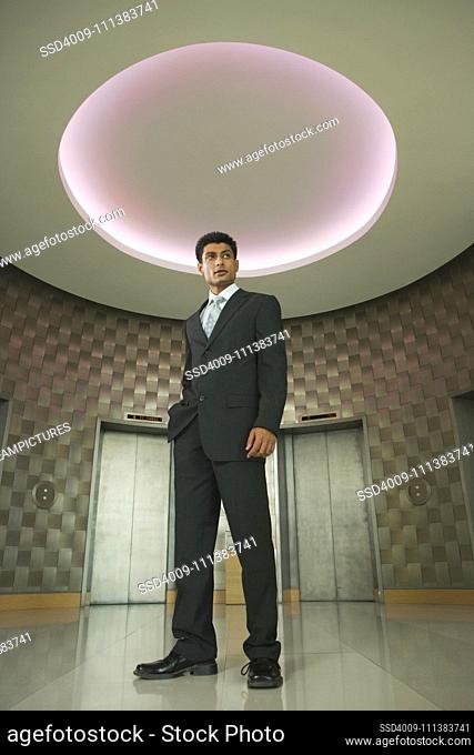 Indian businessman in office lobby