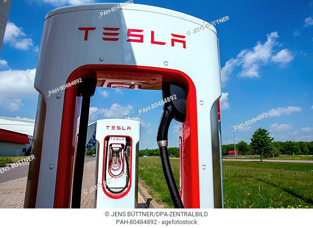 Six charging stations the company Tesla in front of the Alpincenter in Wittenburg, Germany, 18 May 2016. They are in the expectation of for electric cars that...