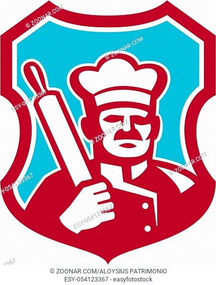 Illustration of a baker chef cook holding rolling pin set inside shield crest on isolated background done in retro style