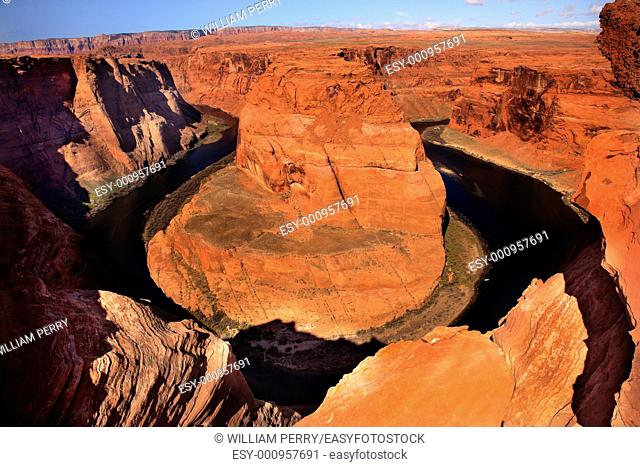 From the Rim Horseshoe Bend Orange Glen Canyon Overlook Small Boat Blue Colorado River Entrenched Meander Page Arizona