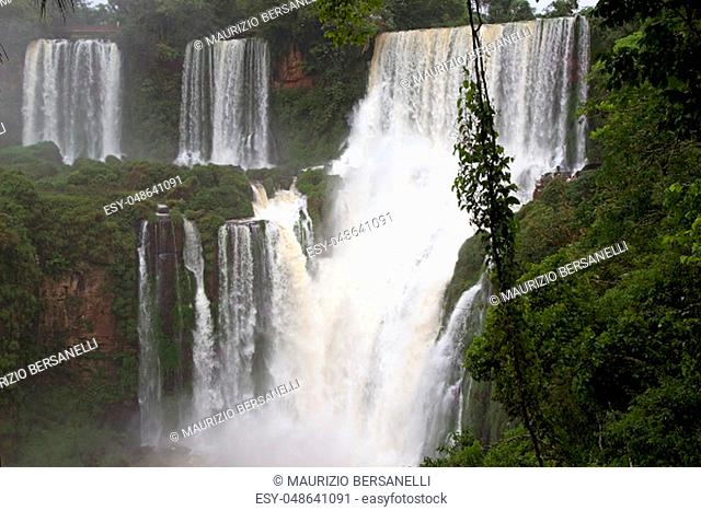 Iguazu Falls in the Argentine side. Iguazu Falls are waterfalls of Iguazu River on the border of the Argentine province of Misiones and the Brasilian state of...