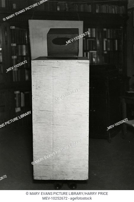 Photograph of plywood ôshroudö and visor, screening every part of the ôagentÆsö body, except for the feet, 1933. Constructed for tests with the Czechoslovak...