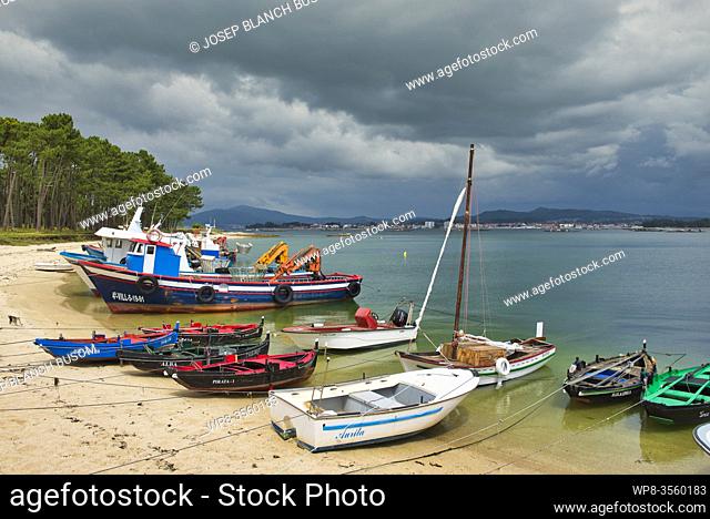 Traditional fishing boats by the beach Vigo, Galicia, Spain