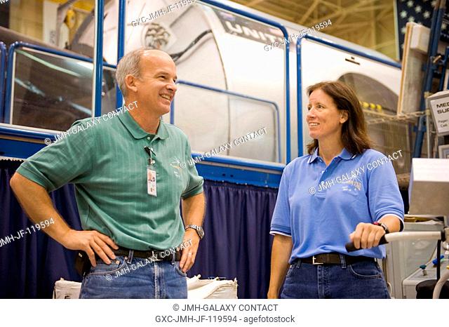NASA astronauts Jeffrey Williams, Expedition 21 flight engineer and Expedition 22 commander; and Shannon Walker, Expedition 2425 flight engineer