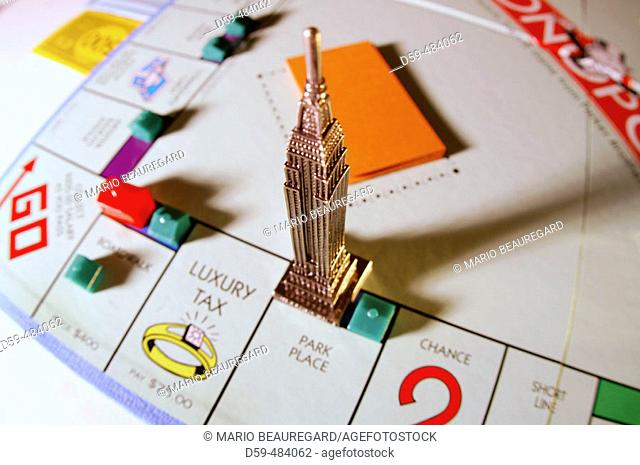 Monopoly board game, with skyscraper on Park Place square
