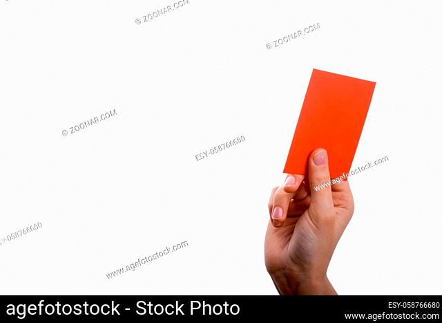 hand holding a red envelope on a white background