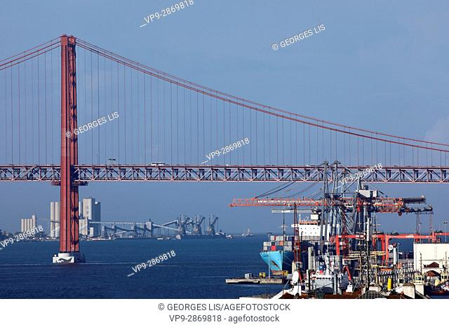 iron suspension 25 de Abril bridge Tagus Tejo crane harbour Lisbon Portugal