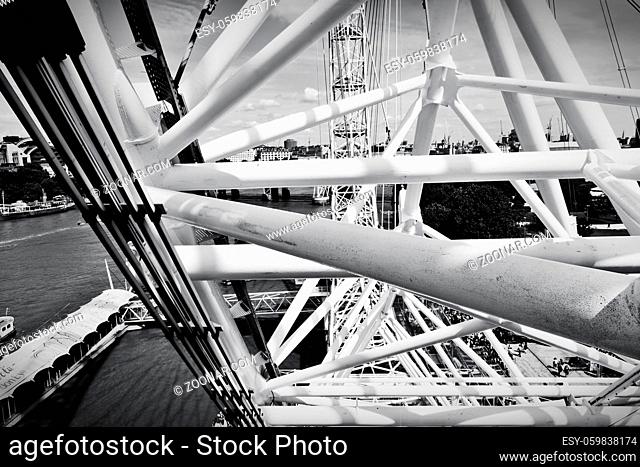 LONDON - JUNE 25: London Eye construction, mechanism as seen from the capsule on June 25 2015 in London, UK. The pipes make interesting architecture design