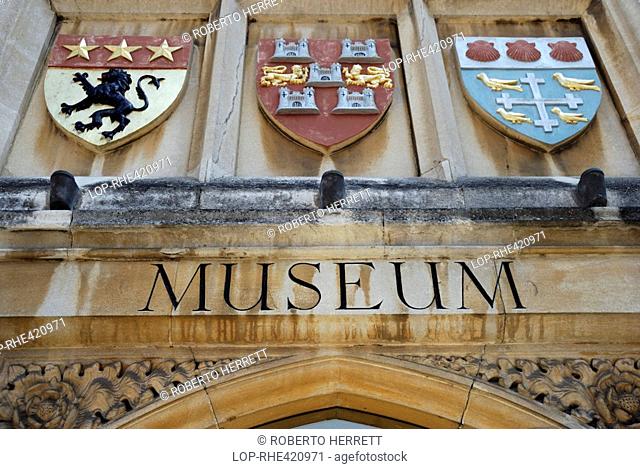 England, Hampshire, Winchester, Coats of Arms above the entrance to Winchester City Museum. The Museum tells the story of the city through display of its...
