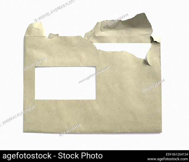 Torn envelope paper with white letter visible, isolated