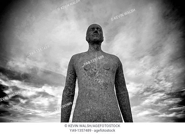 One of artist Anthony Gormley's 100 statues covering three by one kilometres of Croston beach, Merseyside