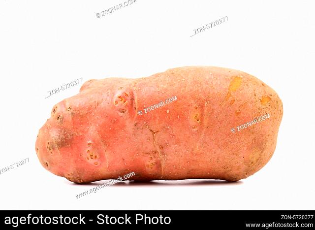 Red potato tuber isolated on a white background