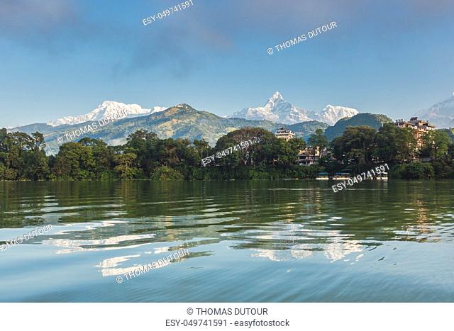 The Machapuchare and Annapurna range seen from Phewa Lake in Pokhara, Nepal