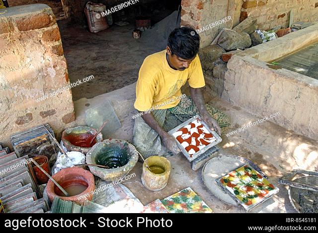 A man making Athangudi kannadi kal, Process of making tile in Athangudi, Chettinad, Tamil Nadu, South India, India, Asia