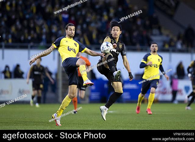 Union's Christian Burgess and STVV's Daichi Hayashi pictured in action during a soccer match between Royale Union Saint-Gilloise and Sint-Truidense VV