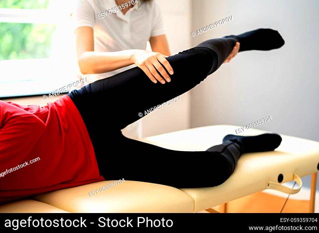 Physiotherapist Doing Thigh Rehabilitation Physio Therapy Massage