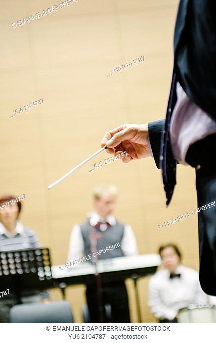 Hand of director of orchestra music
