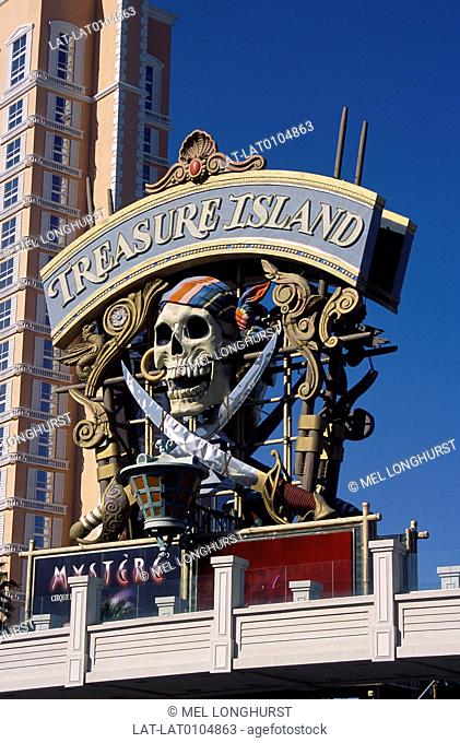 The Strip. Treasure Island hotel, casino. Entrance sign. Themed hotel. Skull, crossbones, pirates