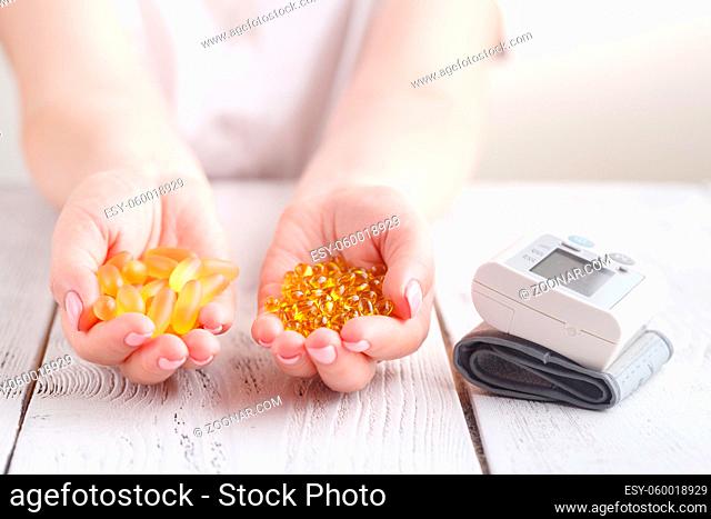 capsules of fish oil and vitamin E protection from heart diseases