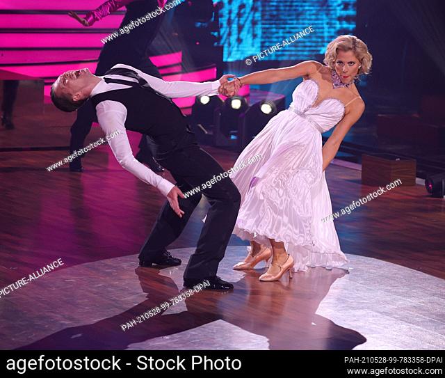 28 May 2021, North Rhine-Westphalia, Cologne: Valentina Pahde and Valentin Lusin dance a mixture of Slowfox, Quickstep and Charleston to Marilyn Monroe's song...