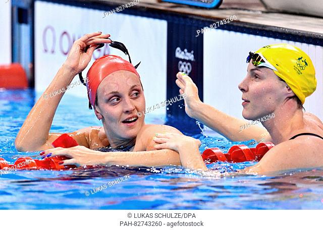 Francesca Halsall (L) of Great Britain and Bronte Campbell of Australia react after the Women's 50m Freestyle Semifinal of the Swimming events during the Rio...