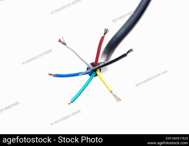 color coded electric wire over white background