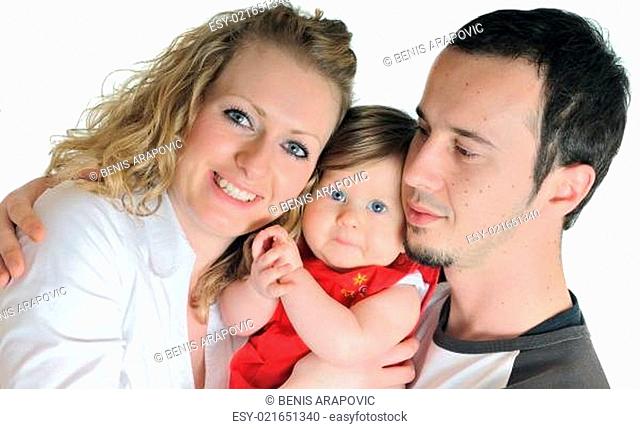 happy young family together in studio
