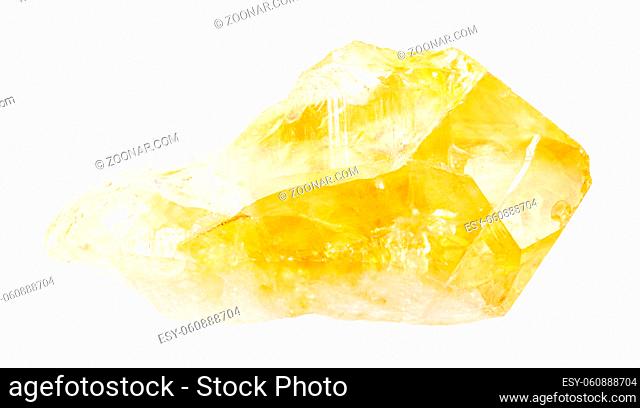 closeup of sample of natural mineral from geological collection - unpolished citrine (yellow quartz) crystal isolated on white background