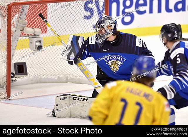 L-R JUSTUS ANNUNEN, goalie of Finland receives a goal during the 2020 IIHF World Junior Ice Hockey Championships match for 3rd place: Sweden vs Finland in...