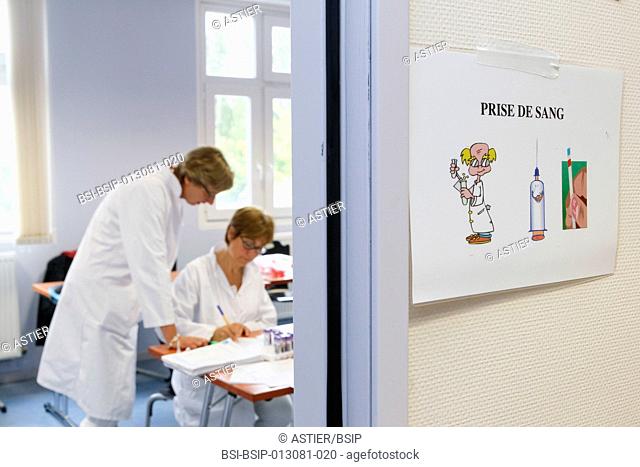To be used in the context of the reportage only. Medical check-up run by IPL Lille Institut Pasteur in Arras, France. IPL delocalise these check-ups to help...