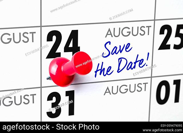 Wall calendar with a red pin - August 24