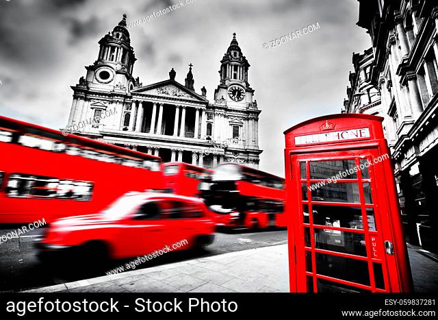 St Paul#39;s Cathedral facade, red bus, taxi cab and red telephone booth. Symbols of London, the UK. Black and white