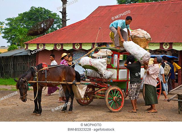 A horse cart delivers goods at the train station, Burma, Pyin U Lwin