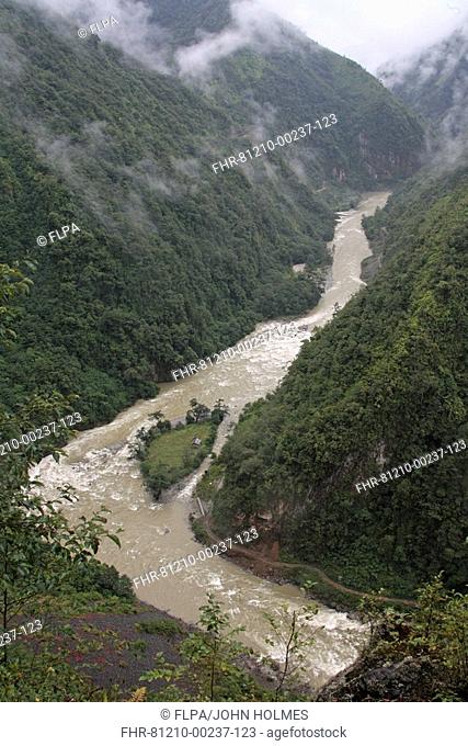 View of river and forested valley slopes, Dulongjiang Taron River, Gaoligong Shan, Yunnan, China, september