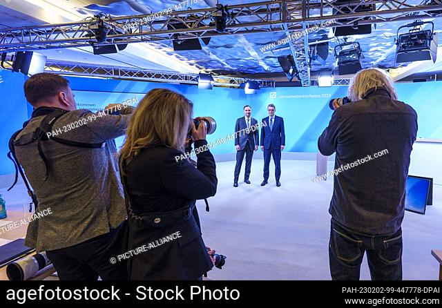 02 February 2023, Hesse, Frankfurt/Main: James von Moltke (back l), Deputy Chairman of the Management Board of Deutsche Bank, and Christian Sewing