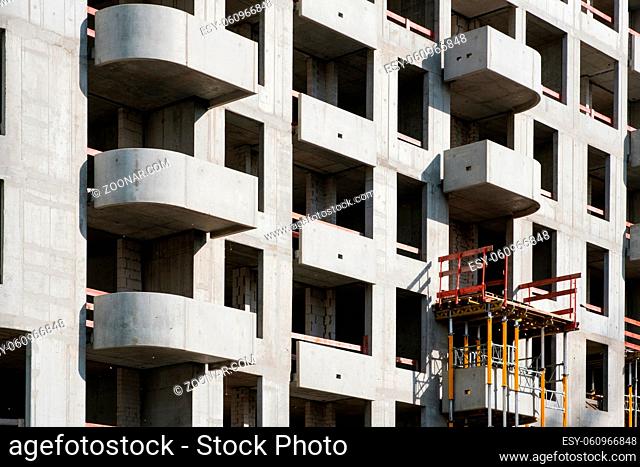 building shell of apartment building under construction - real estate -