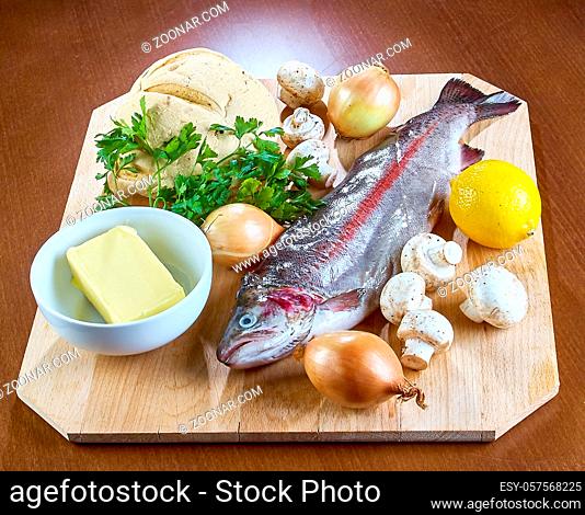 Ingredients for cooking stuffed fish mushrooms onion salad butter bread Complete collection of recipes