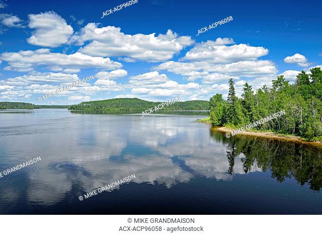 Couds reflected in Kenogamisis Lake Geraldton Ontario Canada