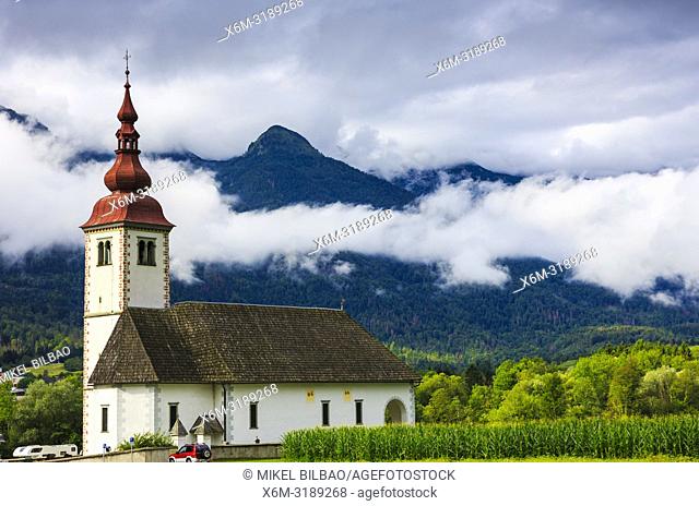 Assumption of the Virgin Mary Church in the village of Bitnje. Upper Carniola region. Slovenia, Europe