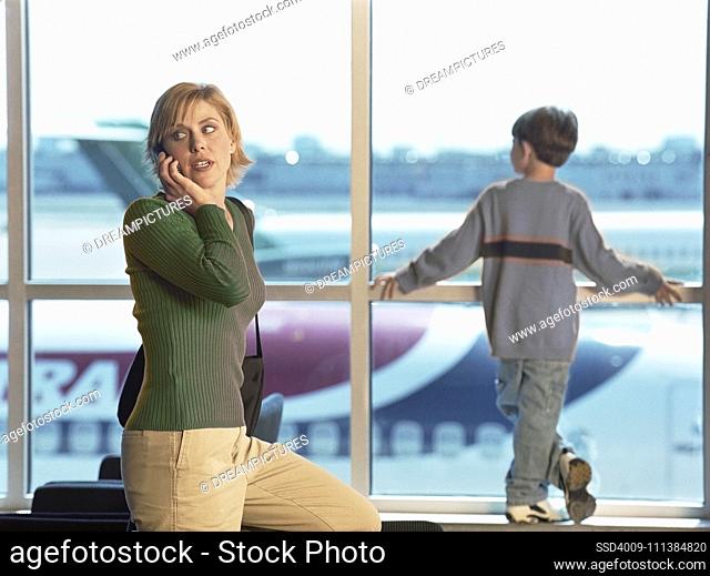 Mother and son at airport