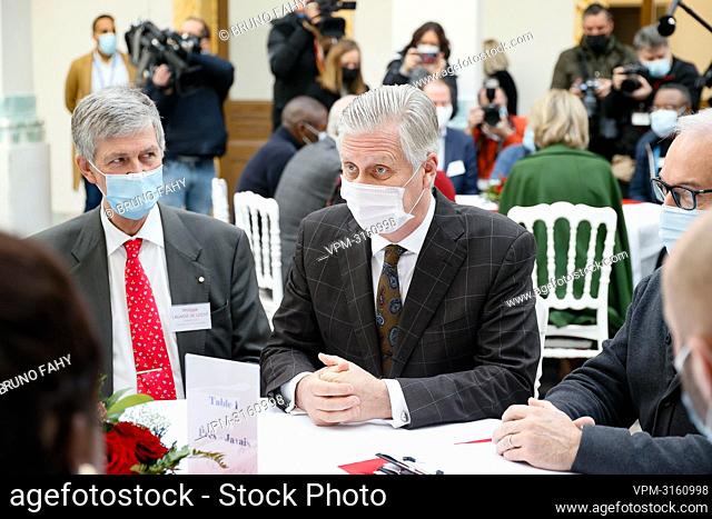 King Philippe - Filip of Belgium pictured during a Christmas activity organised by Caritas Secours and several local associations for the victims of the July...